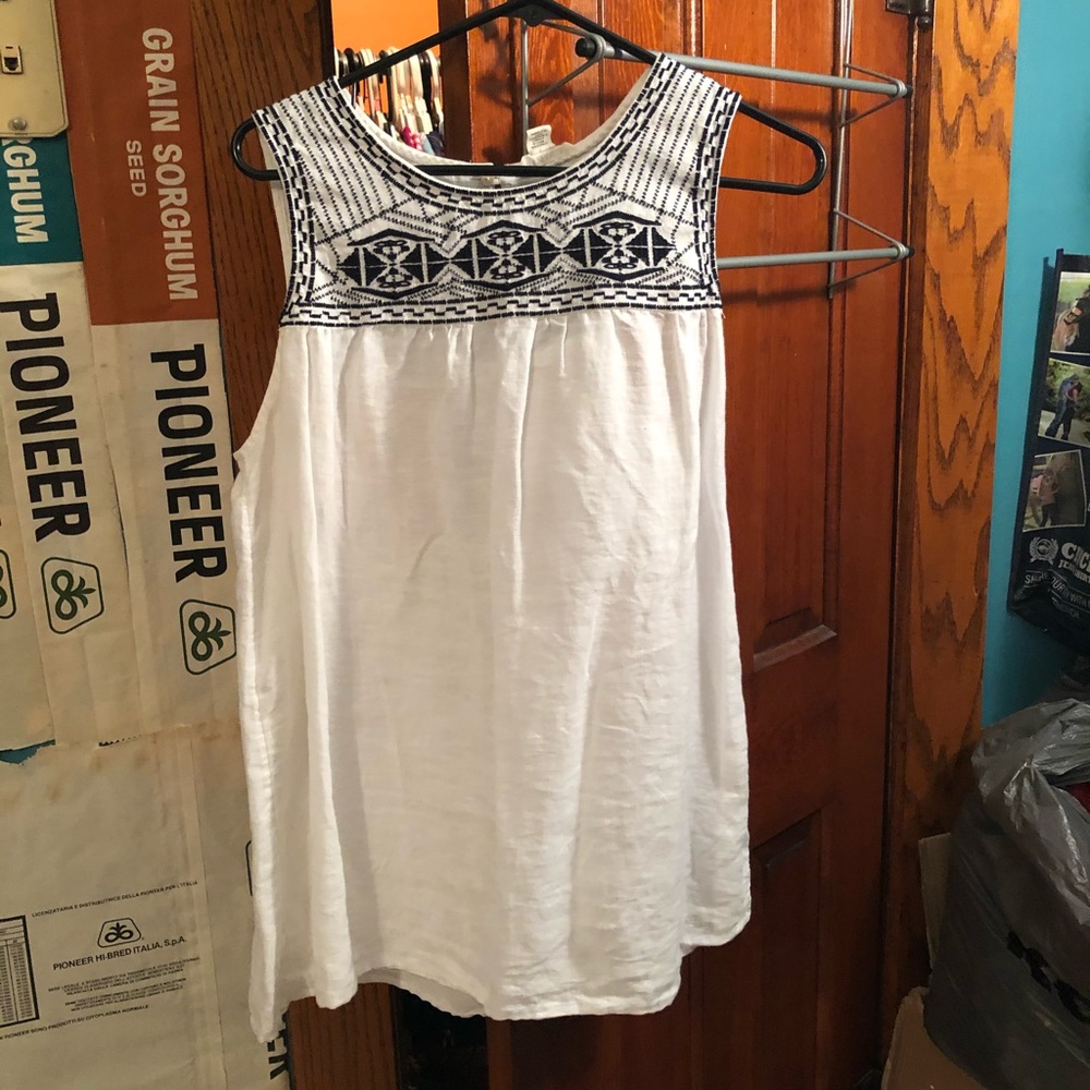 White tank top with navy embroidery